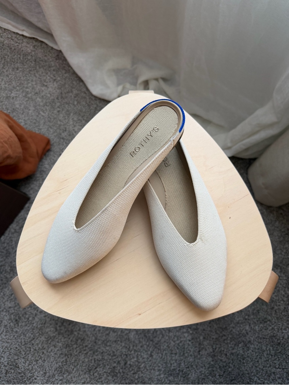 Rothy's Cream Slingback Flats with Subtle Blue Accent